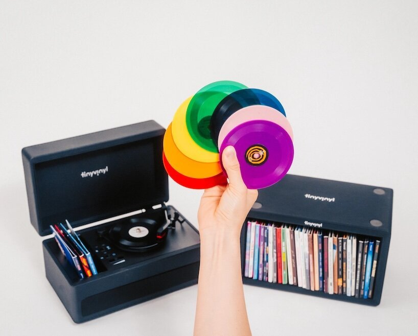 tiny vinyl player spins four-inch records on a miniature turntable - 2