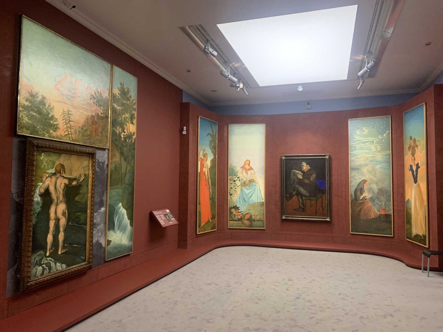 A gauche: Baigneur au rocher (vers 1869) de Paul Cézanne, présenté dans l’exposition «Cézanne au Jas de Bouffan», musée Granet, Aix-en-Provence, 2025 (©Guy Boyer).